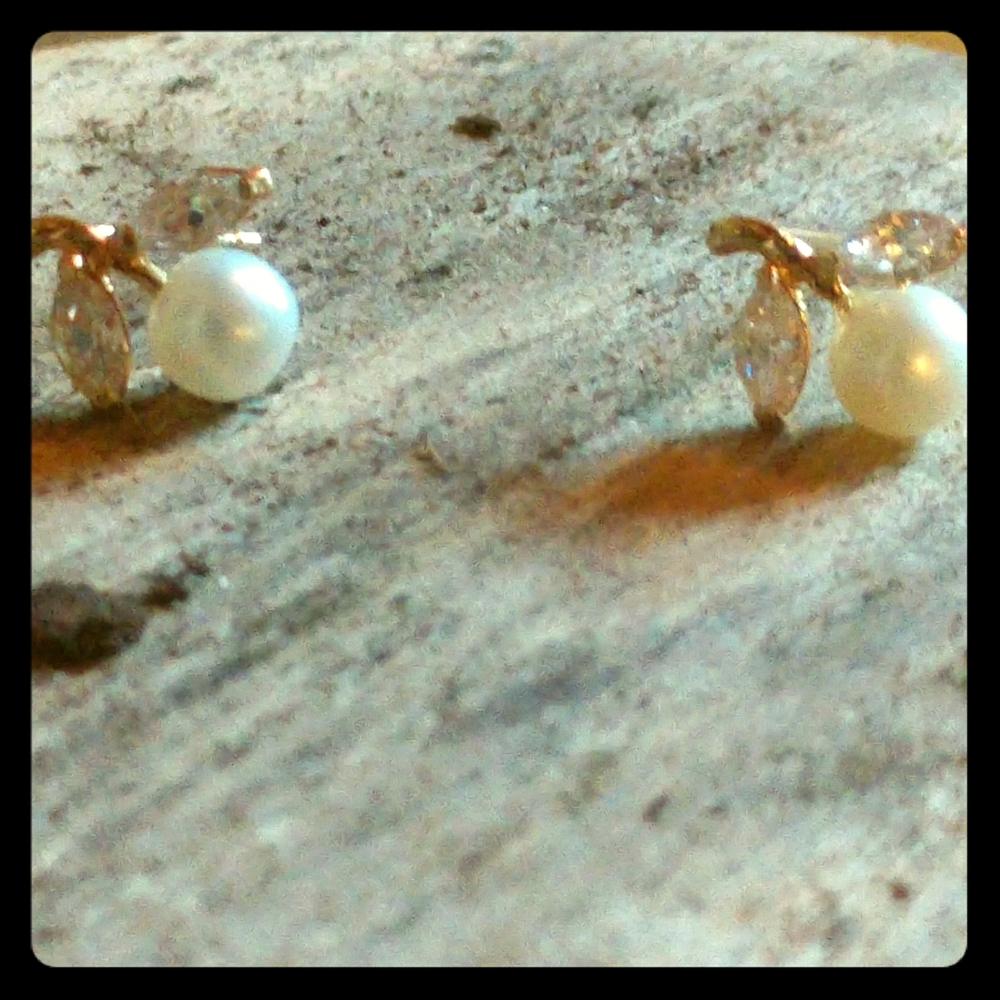 Pearl and diamond studded earrings